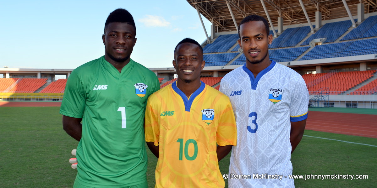 L-R: Olivier Kwizera (Goalkeeper);  Haruna Niyonzima (Captain); Yannick Mukunzi - modelling the new Rwanda Amavubi Kit by AMS  [new goalkeeping; home and away kits by AMS are pictured at training camp ahead of Rwanda Amavubi v Mozambique, 13 June 2015  (Pic © Darren McKinstry / www.johnnymckinstry.com)]