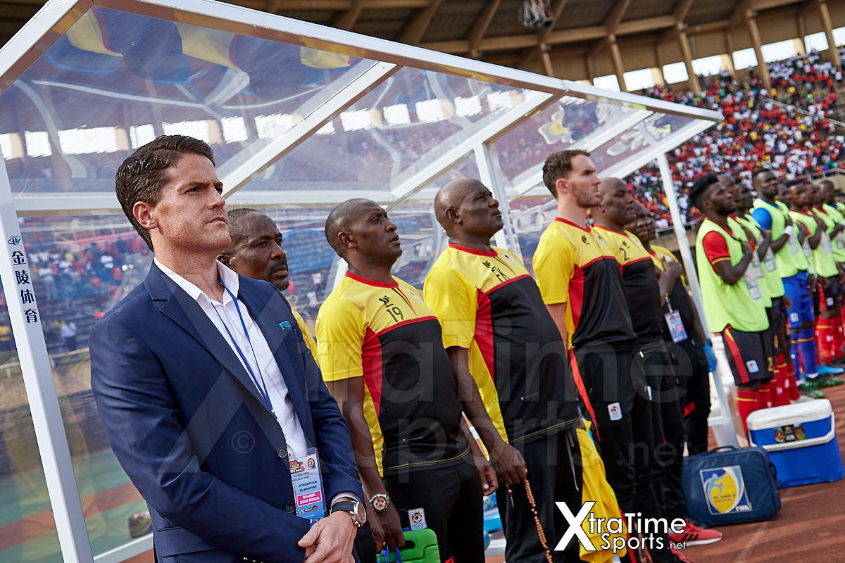 Kampala, Uganda. 17 Nov 2019.  Johnathan McKinstry (Head Coach, Uganda), Abdullah Mubira (Assistant Coach, Uganda), Charles Livingstone (Assistant Coach, Uganda), Fred Kajoba (Goalkeeping Coach, Uganda), Alex McCarthy (Performance Analyst, Uganda) and other technical staff in the dug out ahead of the game.  Uganda v Malawi, CAF Nations Cup / African Cup of Nations Qualifier.  Nelson Mandela Stadium at Namboole.  Credit: XtraTimeSports (Darren McKinstry)