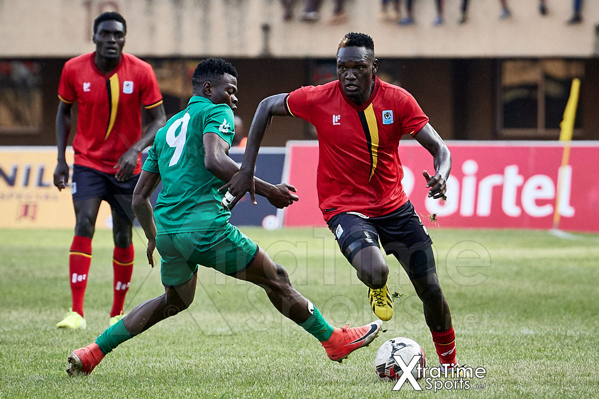 Kampala, Uganda. 17 Nov 2019.  Joseph Ochaya (2, Uganda) moves past Richard Mbulu (9, Malawi).  Uganda v Malawi, CAF Nations Cup / African Cup of Nations Qualifier.  Nelson Mandela Stadium at Namboole.  Credit: XtraTimeSports (Darren McKinstry)