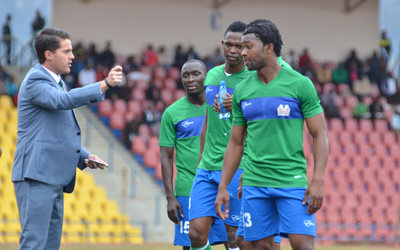 Coach McKinstry speaks to players from the touchline just before half time [Leone Stars v Swaziland May 2014 (Pic: Darren McKinstry)]